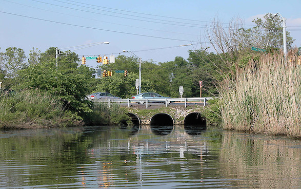 At the intersections of State Routes 322 and 33, three large stormawater culverts open to the headwaters of the North Fork of the Tred Avon River, Easton, MD.